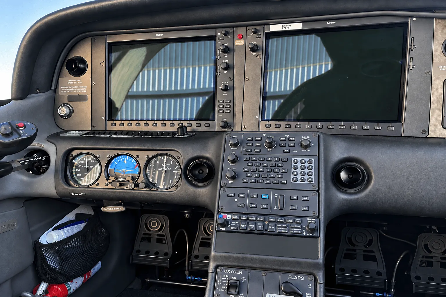 Private aircraft cockpit with flight controls and instrument displays